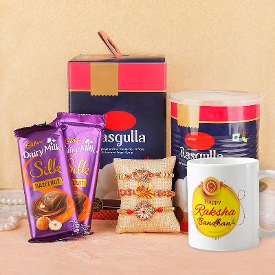 Set of 3 Rakhis With Mug Cadbury Silk & Rasgulla Delight