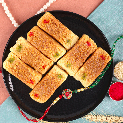 Multicolour Om Rakhi With Milk Cake