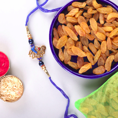 Peacock Blue Rakhi With Raisins Combo