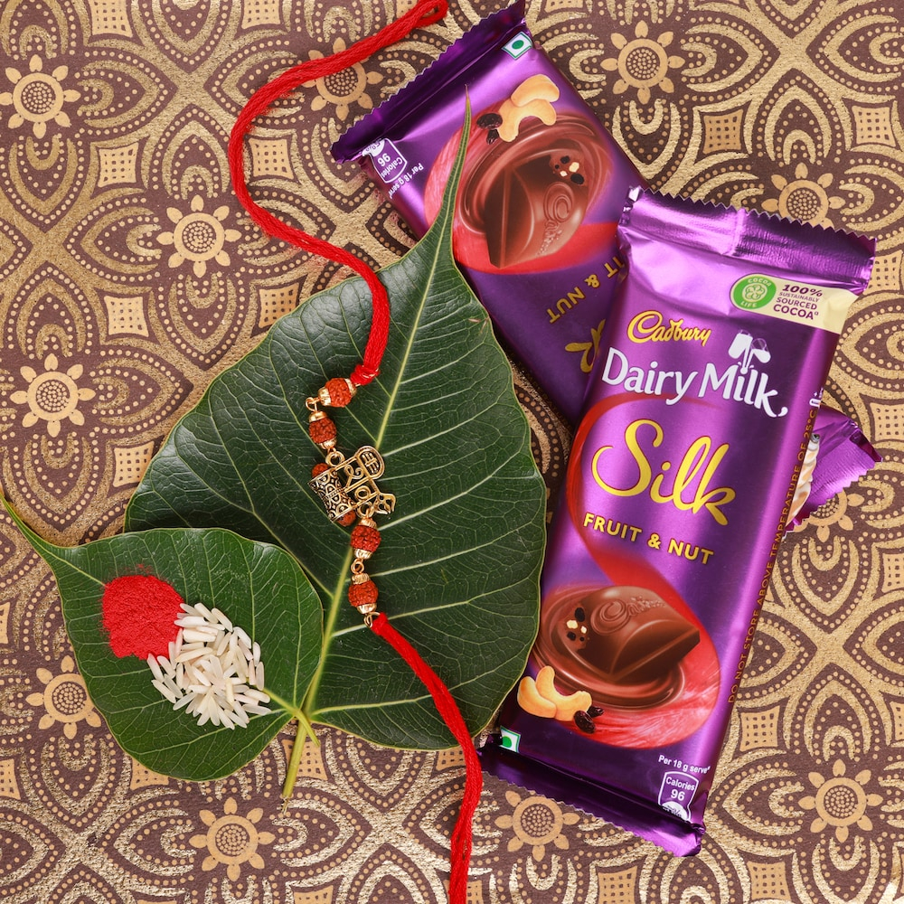  Shiv Rakhi And Cadbury Dairy Milk Silk Fruit & Nut Chocolate