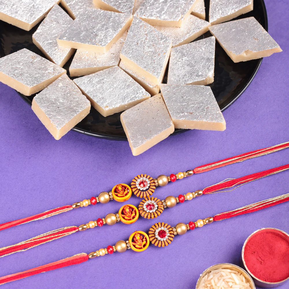  Red Stone Set Of 3 Rakhi With Kaju Katli